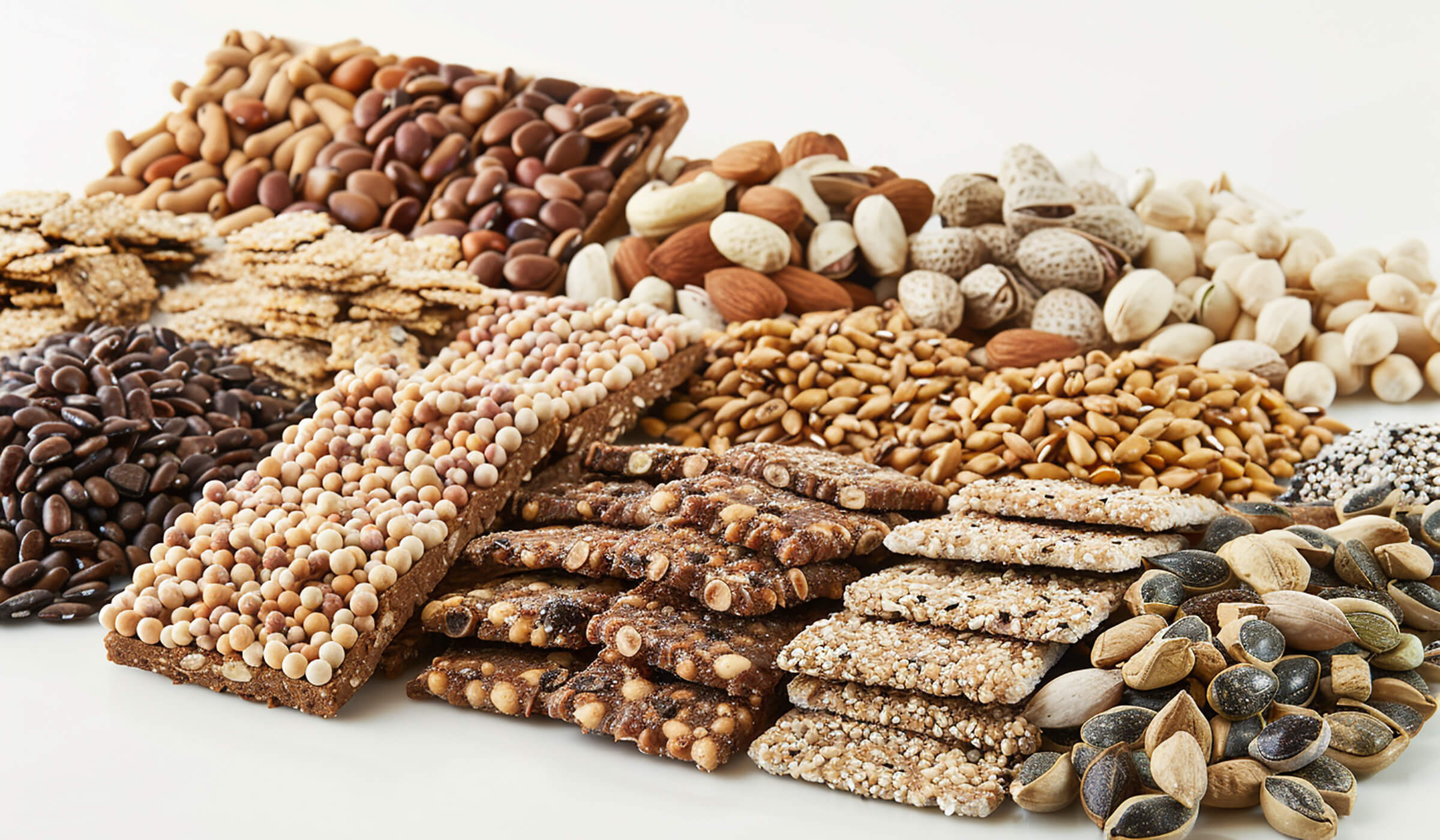 A table of protein rich snacks, nuts, legumes, etc...